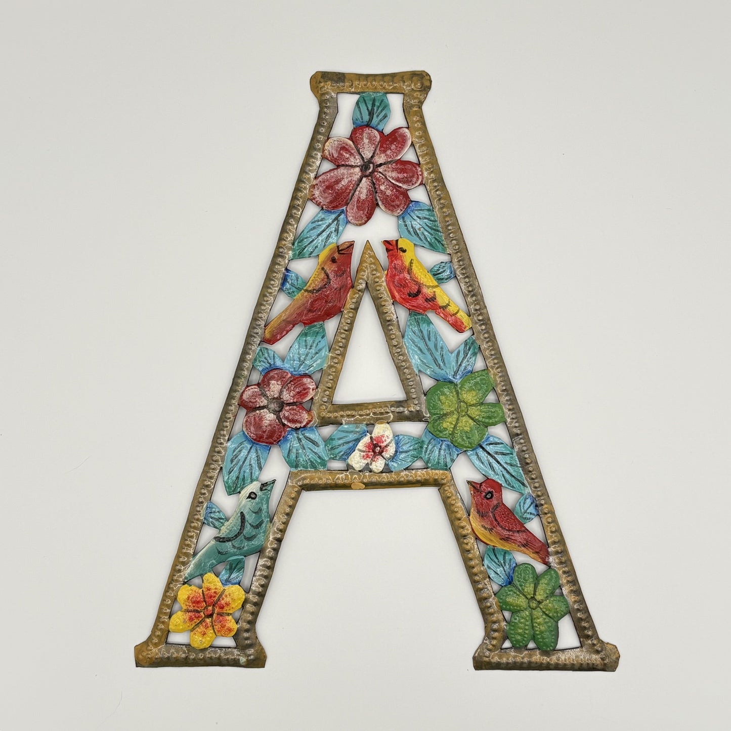 Decorative wall art letter 'A' with floral and bird designs, ethically and sustainably handcrafted, fair trade handmade