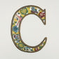 Decorative wall art letter 'C' with floral and bird designs, ethically and sustainably handcrafted, fair trade handmade