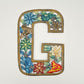 Decorative wall art letter 'G' with floral and bird designs, ethically and sustainably handcrafted, fair trade handmade