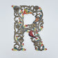 Decorative wall art letter 'R' with floral and bird designs, ethically and sustainably handcrafted, fair trade handmade