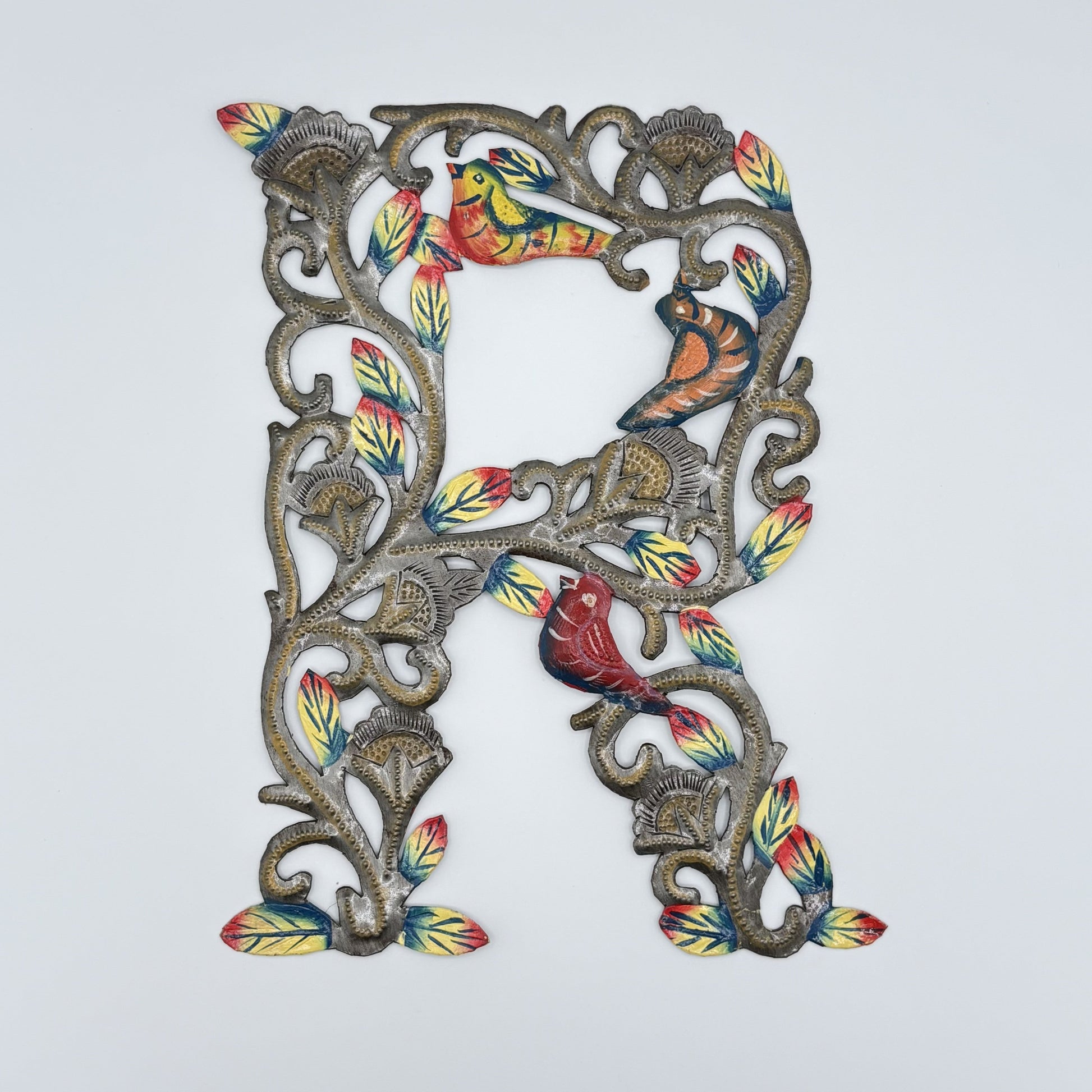 Decorative wall art letter 'R' with floral and bird designs, ethically and sustainably handcrafted, fair trade handmade