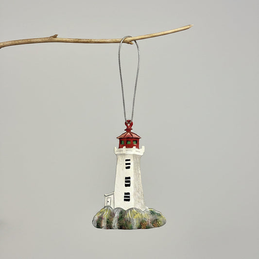 Fair trade handcrafted upcycled metal lighthouse ornament with a red top, sustainably crafted, artisan made