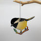 Eco-friendly handcrafted upcycled metal Black-capped Chickadee bird ornament, ethically handmade, sustainable