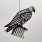 Sustainable handcrafted upcycled metal ornament of a Gyrfalcon, fair trade, ethically handmade, eco-friendly