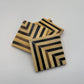 Set of 4 wooden coasters inlaid with camel bone with dark brown and beige chevron pattern, fair trade