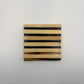 Set of 4 wooden coasters inlaid with camel bone with dark brown and beige stripe pattern, fair trade