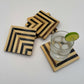 Set of 4 wooden coasters inlaid with camel bone with dark brown and beige chevron pattern, fair trade