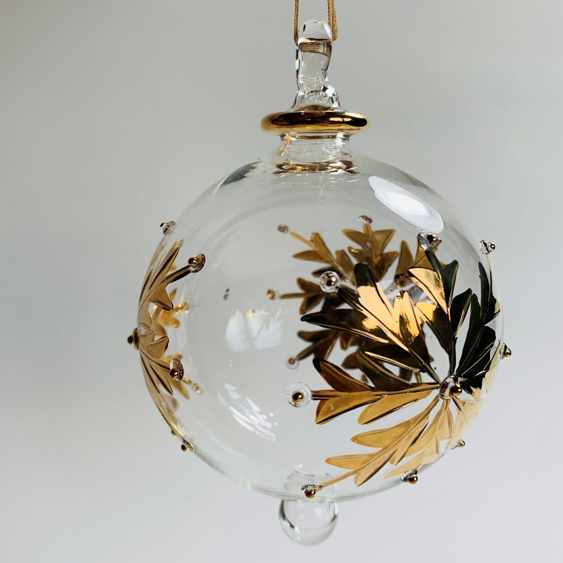 Ethically Sourced Blown Glass Ornament - Gold Snow Flake