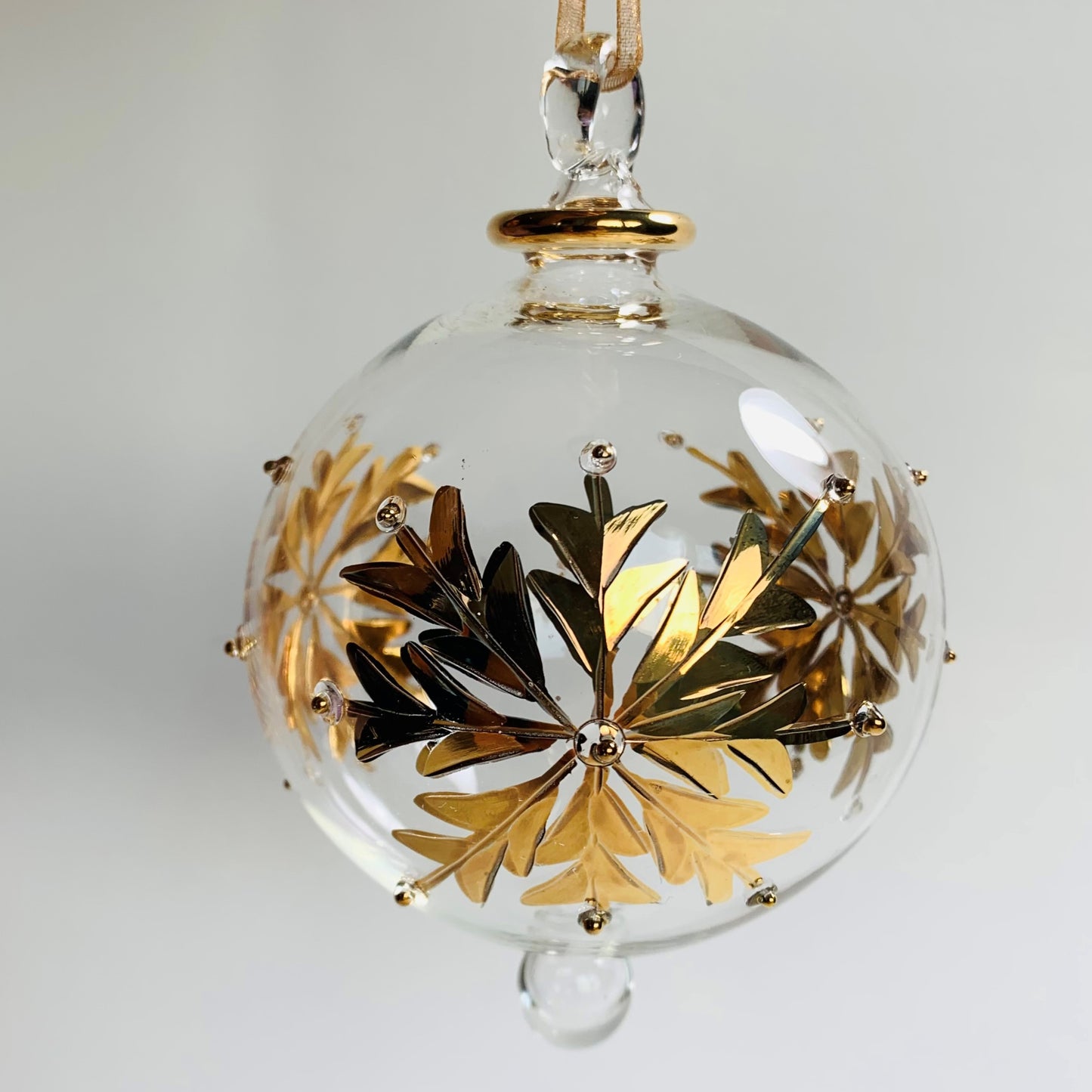 Ethically Sourced Blown Glass Ornament - Gold Snow Flake