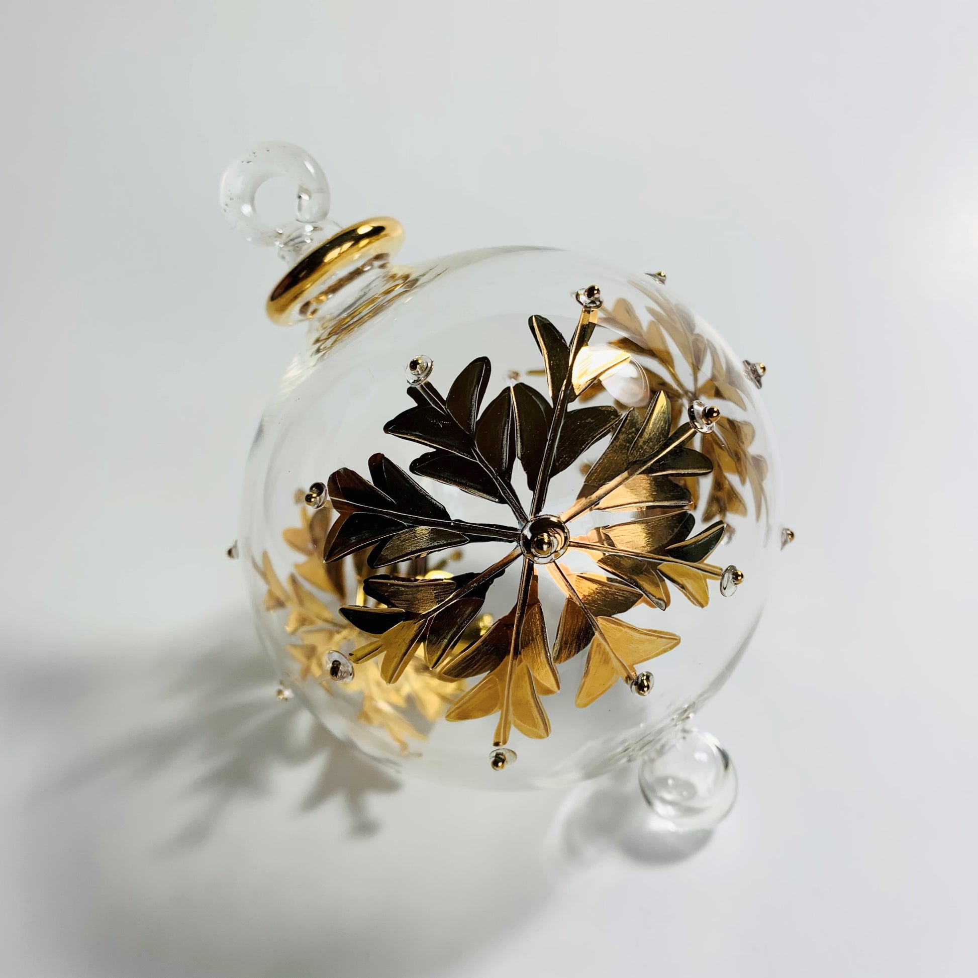 Ethically Sourced Blown Glass Ornament - Gold Snow Flake